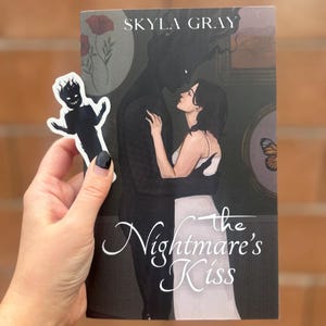 Monster Research Facility Book 1: The Nightmare&#39;s Kiss - a monster romance novel by Skyla Gray - signed paperback with sticker