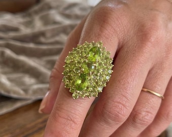 14KY Peridot with sorted shapes cocktail Round & pear