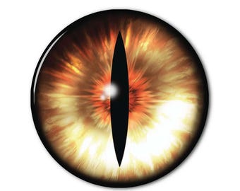May include: A circular cabochon featuring a detailed graphic of a reptilian eye. The iris displays a vibrant gradient of yellow, orange, and deep red tones with a radial fiber pattern, centered by a sharp, vertical black slit pupil on a white background.