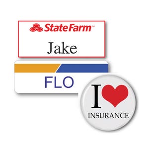 May include: Two rectangular name badges and one circular pin button. The top badge is white with a red border, the State Farm logo, and the name Jake. The second badge has an orange and blue stripe with the name FLO. The pin says I heart INSURANCE.