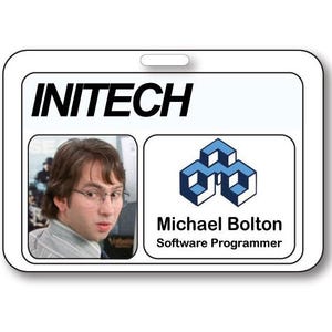 May include: A rectangular white plastic ID badge featuring the black text INITECH at the top. On the left is a photograph of a person with brown hair and glasses. On the right is a blue geometric logo above the text Michael Bolton Software Programmer.