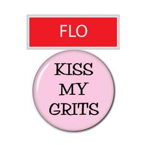May include: A round pink pinback button featuring the black text KISS MY GRITS centered on the surface. Above the button is a rectangular red sign with the white text FLO centered inside. The design is presented against a plain white background.