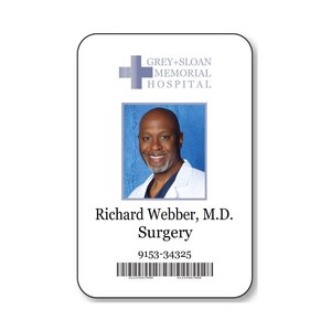 May include: A rectangular identification badge for Grey+Sloan Memorial Hospital featuring a photo of a smiling individual in a white medical coat. The text reads Richard Webber, M.D., Surgery, 9153-34325, with a barcode at the bottom.
