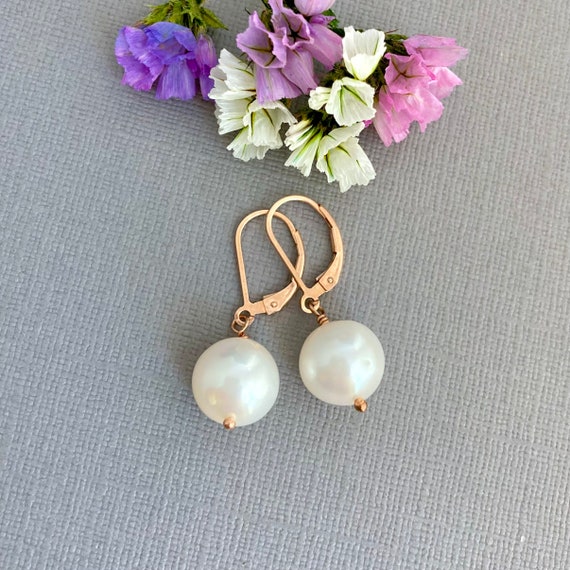 B-grade Saltwater Cultured Pearl Stud Earrings 14k Yellow Gold-filled B-grade Saltwater Cultured Pearl Stud Earrings 14k Yellow Gold-filled