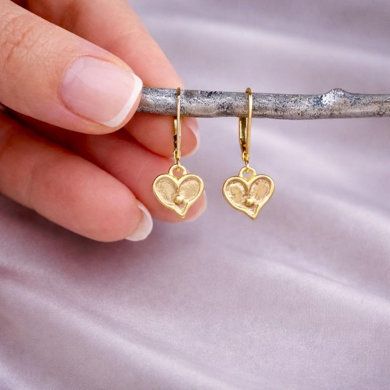 Gold Heart Earrings Dainty Design Style Minimalist Jewelry Collection Leverback Closure System Tiny Heart Charm Everyday Wear Option Special Occasion Accessory Birthday Gift Idea Girlfriend Present Choice Daughter Jewelry Selection Polished