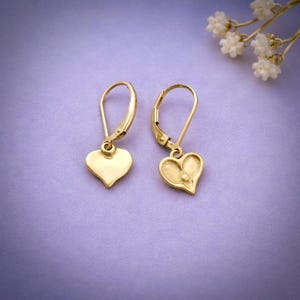 Tiny Heart Earrings Gold Vermeil Material Dainty Jewelry Collection Everyday Wear Accessory Leverback Design Style Minimalist Fashion Trend Simple Elegant Look Birthday Present Idea Girlfriend Gift Option Daughter Jewelry Choice Polished