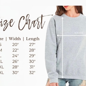 May include: A light gray sweatshirt with a size chart. The chart shows measurements for sizes S to 3XL, with widths ranging from 20" to 30" and lengths from 27" to 32". The sweatshirt is shown with length and width measurements.