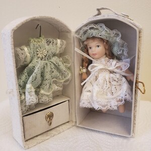 Vintage Rare Dainty porcelainDoll With Wardrobe And Extra Dress. Doll Is 4 1/2&quot;H