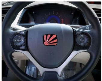 Custom Steering wheel and trim emblems for all makes and models
