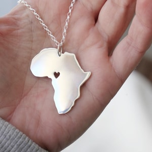bold oversized Africa pendant / big chunky statement African necklace / large, thick and heavy Africa pendant measuring 4cm x 2mm