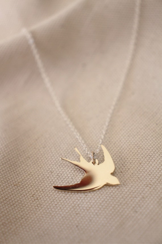 Gold swallow pendant discount