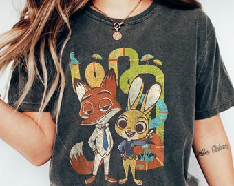 Disney Zootopia 2 Nick & Judy Shirts, Nick Wilde Whimsical Pipes Adventure Tee, Walt Disney Animation Studios Tee, WDW Magic Kingdom Holiday