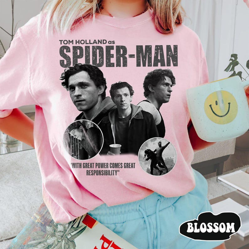 May include: A set of three ceramic mugs with a speckled, cream-colored glaze. Each mug features a different hand-painted design: a blue and green leaf, a yellow flower, and a red berry. The mugs have a simple, rounded shape.