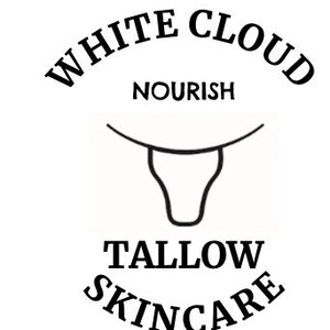 May include: White Cloud Tallow Skincare logo. The text "WHITE CLOUD" arches above the image of a bull's head. The word "NOURISH" is centered below the text. The text "TALLOW SKINCARE" curves below the bull's head image.