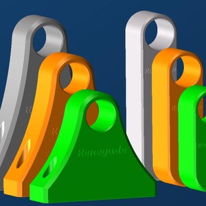 May include: A collection of colorful, 3D-rendered keychains in various shapes. The keychains are in shades of gray, orange, and green, with a circular opening at the top. The word "Renegade" is printed on the green keychain.