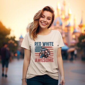 Smiling girl wears a cream t-shirt with Captain America and "RED WHITE AWESOME" over an American flag.