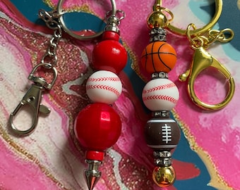 Sport themed Keychains and Badge Reels