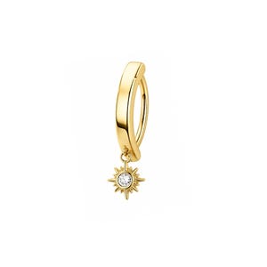 May include: A gold hoop earring featuring a small, dangling starburst charm. The charm is centred with a single, clear, round-cut gemstone. The hoop has a smooth, polished finish and a hinged closure mechanism, creating a clean and simple design.