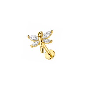 May include: A gold-toned dragonfly stud earring featuring four marquise-cut clear stones forming the wings and a segmented body. The piece includes a flat circular backing post, designed for piercing, with a polished metallic finish throughout.