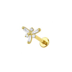 May include: A gold-colored labret stud featuring a floral design. The stud has a flat back and a post for insertion. The flower design is composed of five baguette-cut clear stones and five round clear stones.