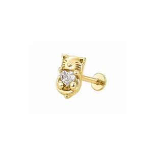 May include: A gold stud earring featuring a cat-shaped design with a small, clear, heart-shaped gemstone held in the center. The earring includes a flat back post and a circular disc backing, crafted from a polished yellow gold-toned metal.