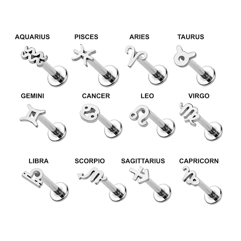 May include: A collection of twelve silver-toned metal labret studs, each featuring a unique zodiac sign symbol. The signs include Aquarius, Pisces, Aries, Taurus, Gemini, Cancer, Leo, Virgo, Libra, Scorpio, Sagittarius, and Capricorn.