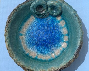 Turquoise blue glazed ceramic bowl with recycled glass and ammonite fossils beach sea ocean