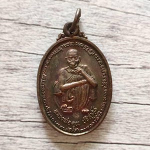 Luang Phor Koon Thai sacred amulet, Vintage Buddha pendant, Authentic Thai talisman, Buddhist protection charm, old lucky Thai amulet.