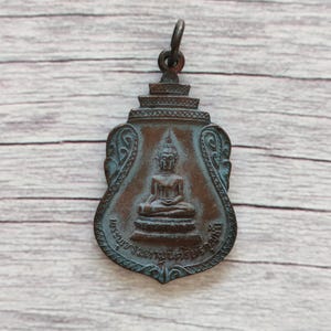 Vintage Thai Buddha Amulet: Phra Phuttha Maha Muni Sri Hariphunchai, Wat Hariphunchai (1976)