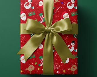 Puede incluir: Una caja de regalo rectangular envuelta en papel rojo con un patrón repetitivo de muñecos de nieve, caras de Papá Noel, renos, bastones de caramelo y calcetines, atada con un lazo ancho y brillante de satén verde oliva.