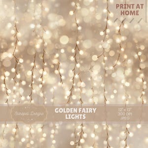 May include: A digital print featuring golden fairy lights. The image has a soft, blurred background with glowing orbs and hanging strands of lights. Text includes "Golden Fairy Lights" and "Print at Home."