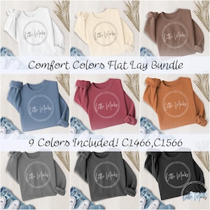 May include: A flat lay of nine crewneck sweatshirts in various colors, including white, beige, brown, blue, red, orange, gray, and black. Each sweatshirt has a circular logo and the text "Little Mocks". The text "Comfort Colors Flat Lay Bundle" and "9 Colors Included! C1466, C1566" are also visible.