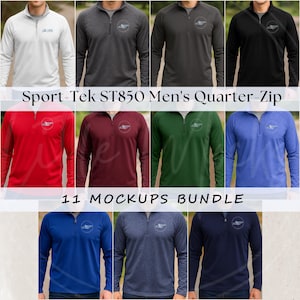 Puede incluir: Una colección de once maquetas de cremallera de cuarto Sport-Tek ST850 en varios colores, incluyendo blanco, gris, negro, rojo, burdeos, verde y azul. Cada camisa tiene una cremallera de cuarto y un pequeño logotipo en el pecho. Se muestra el texto "11 MOCKUPS BUNDLE".