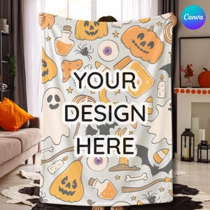 May include: A light gray Halloween-themed blanket featuring pumpkins, ghosts, bats, and potion bottles. The blanket has the text "YOUR DESIGN HERE" in the center. The blanket is held up by a person.