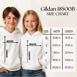 May include: Two children wearing white hoodies, with a size chart for Gildan 18500B. The chart shows sizes XS to XL, with width and length measurements in inches. The text "SIZE CHART" is at the top.