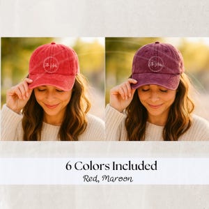 May include: Two baseball caps, one red and one maroon, are shown. Each cap has a curved brim and a circular logo. The text "6 Colors Included" and "Red, Maroon" are displayed below the caps. The caps are worn by a person.
