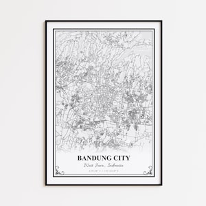 May include: Black framed print of a detailed grayscale map of Bandung City, West Java, Indonesia. The map features intricate street and terrain details. The city name and coordinates are printed at the bottom.