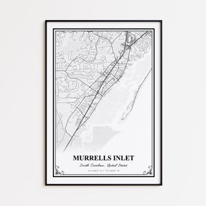 May include: Black framed print of a map of Murrells Inlet, South Carolina, USA. The map is in black and white, showing roads, waterways, and the town's layout. The text "Murrells Inlet" is centered at the bottom, with coordinates.