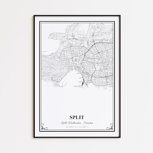 May include: Black framed print featuring a detailed black and white map of Split, Croatia. The city's name is centered at the bottom, with coordinates below. Decorative flourishes are in each corner.