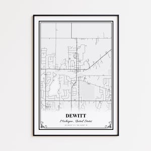 May include: Framed black and white map print of DeWitt, Michigan, United States. The map shows detailed street layouts and geographical features. The city name and coordinates are displayed at the bottom. The print is encased in a black frame.