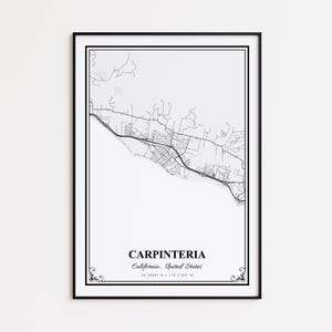 May include: A framed black and white map print of Carpinteria, California, USA. The map shows the city's layout with roads and buildings. The city name and coordinates are printed at the bottom. The frame is black.