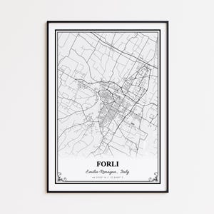 May include: Framed print showing a detailed black and white map of Forlì, Italy. The map's intricate network of streets and roads is set against a white backdrop, with the city's name and coordinates at the bottom.