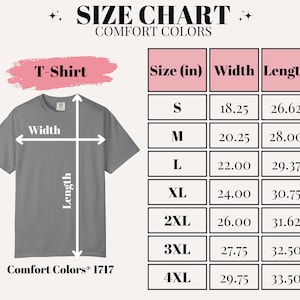 May include: A size chart for Comfort Colors T-shirts, with measurements in inches. The chart includes sizes S to 4XL, detailing width and length for each size. The T-shirt is gray.