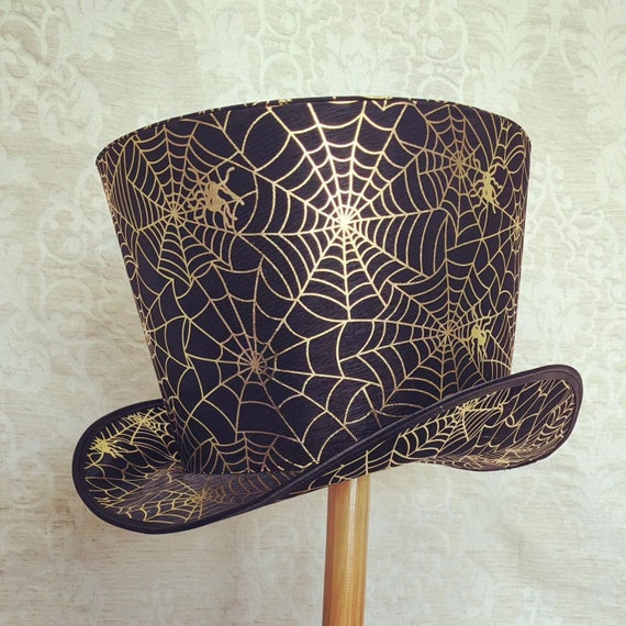 Halloween black and gold hat, spiderweb hat for costuming, festivals, stage or theatre. Halloween hat, LARP, Stage costume, Gothic fashion.