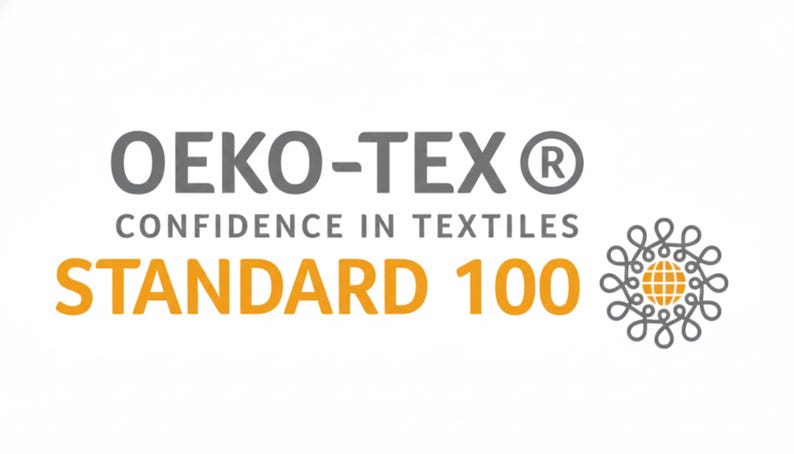 May include: The OEKO-TEX Standard 100 logo features the gray text OEKO-TEX with a registered trademark symbol, the gray text CONFIDENCE IN TEXTILES, the orange text STANDARD 100, and a gray circular floral icon with an orange globe center.
