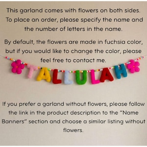 May include: A colorful felt letter garland spelling the name TALLULAH in individual plush letters. The letters are yellow, red, light blue, green, pink, and dark red, flanked by two bright pink felt flowers on a string of small beads.