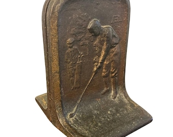 Sujetalibros antiguos de estilo Art Nouveau / Figura en relieve de golfista en posición de golpeo y caddie / Bronce