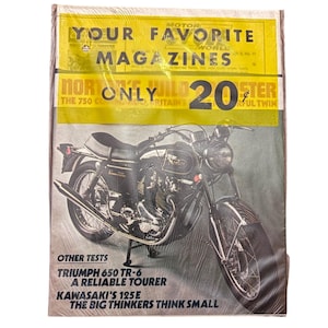 May include: A vintage magazine cover featuring a black motorcycle with chrome accents. The cover has yellow and white text that reads "YOUR FAVORITE MAGAZINES" and "MOTOR WORLD". Additional text includes "TRIUMPH 650 TR-6" and "KAWASAKI'S 125E".