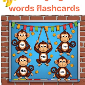 Op de afbeelding: Educatieve flashcards met cartoonapen en veelvoorkomende woorden. De blauwe achtergrond heeft vijf apen met de woorden: "the", "they", "you" en "see". De tekst "Monkey sight words flashcards" staat bovenaan.