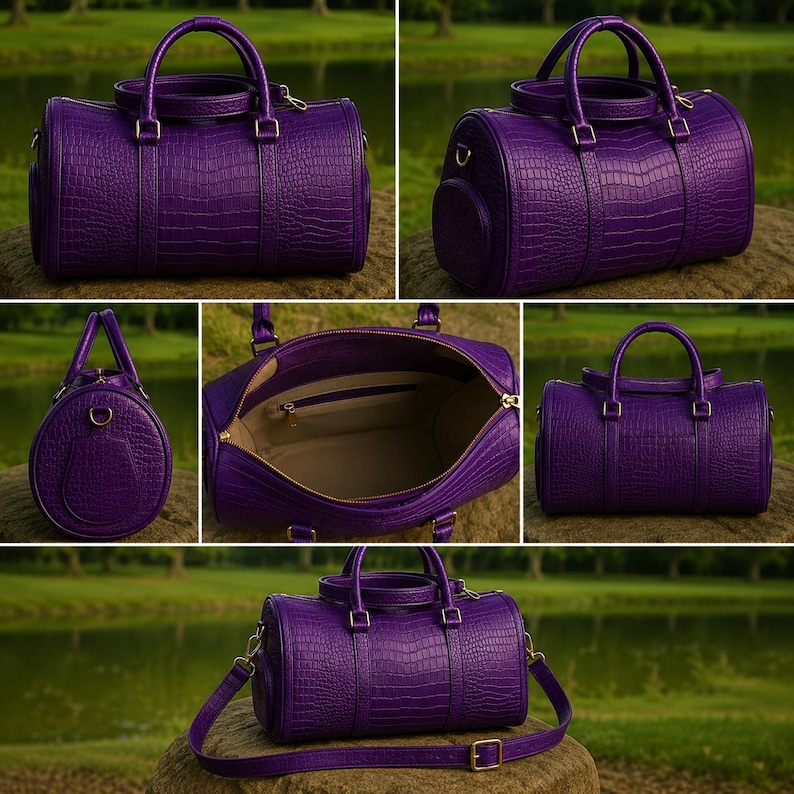 May include: A purple duffel bag with a textured crocodile skin pattern, featuring two top handles, a gold-toned zipper closure, and a detachable shoulder strap. The interior is lined with a light-colored fabric and includes a zippered pocket.